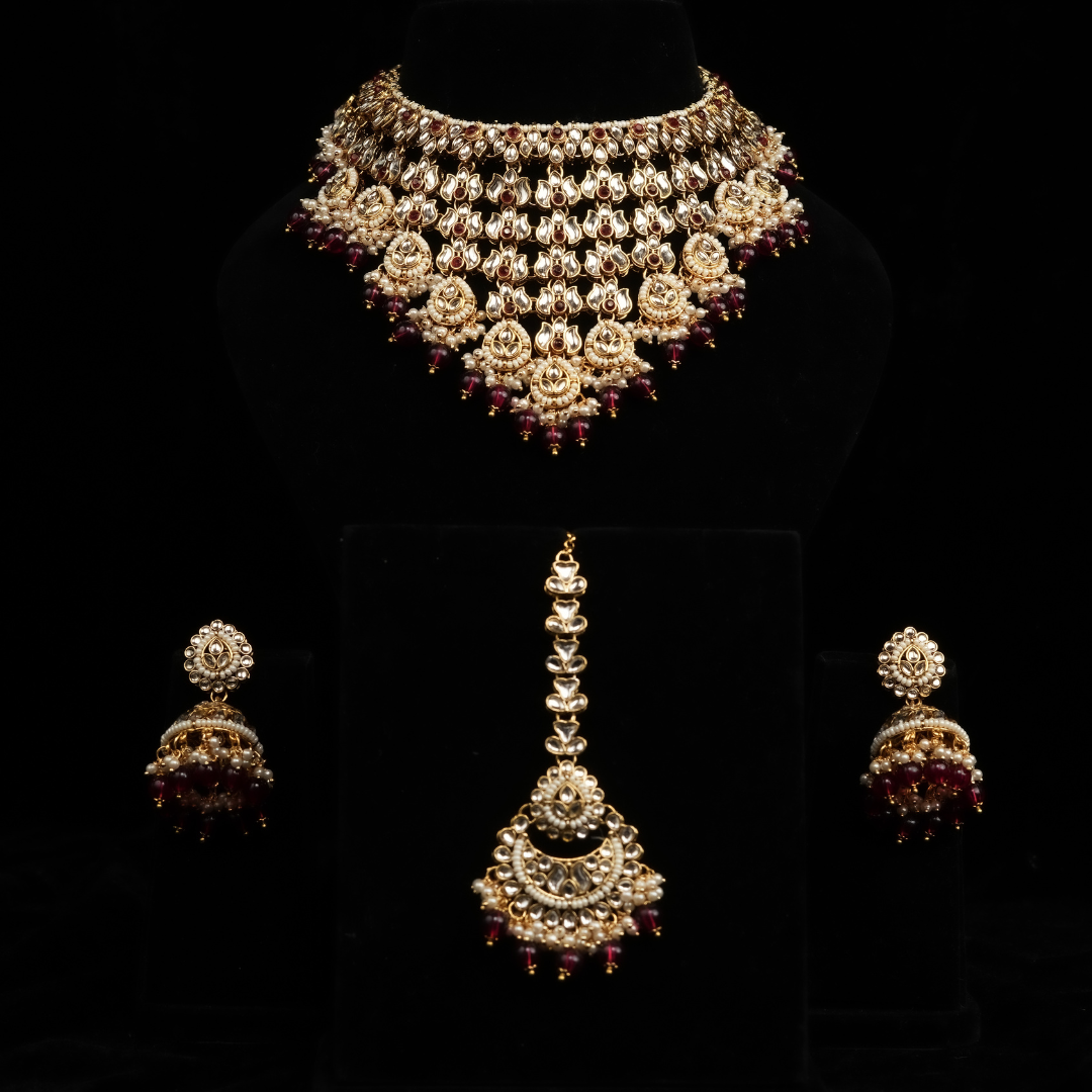 traditional maroon stoned kundan set