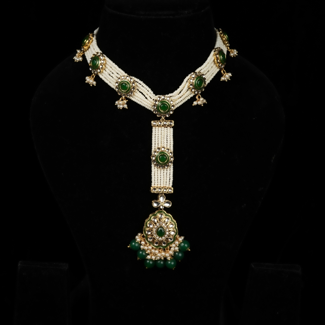 traditional Indian Matha Patti headpiece with emeralds and white pearl strings