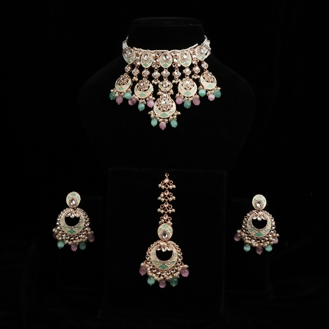 gold choker kundan set with blue and pink pearl stones