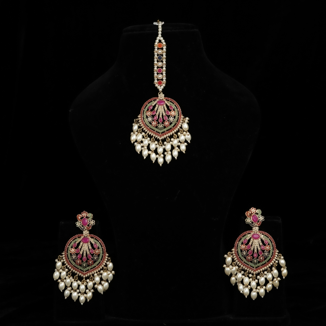 peacock inspired multi coloured earrings and tikka set with hanging pearls for mehendi function