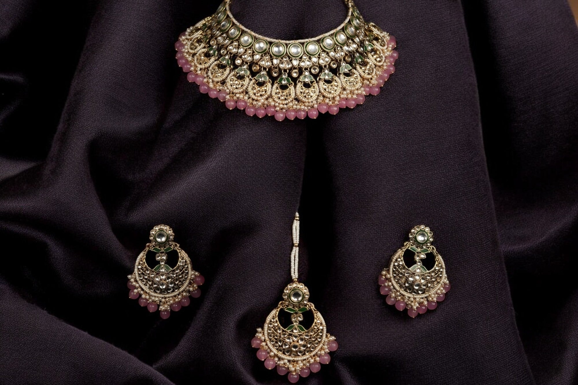 mulberry pink kundan necklace set with earrings and tikka