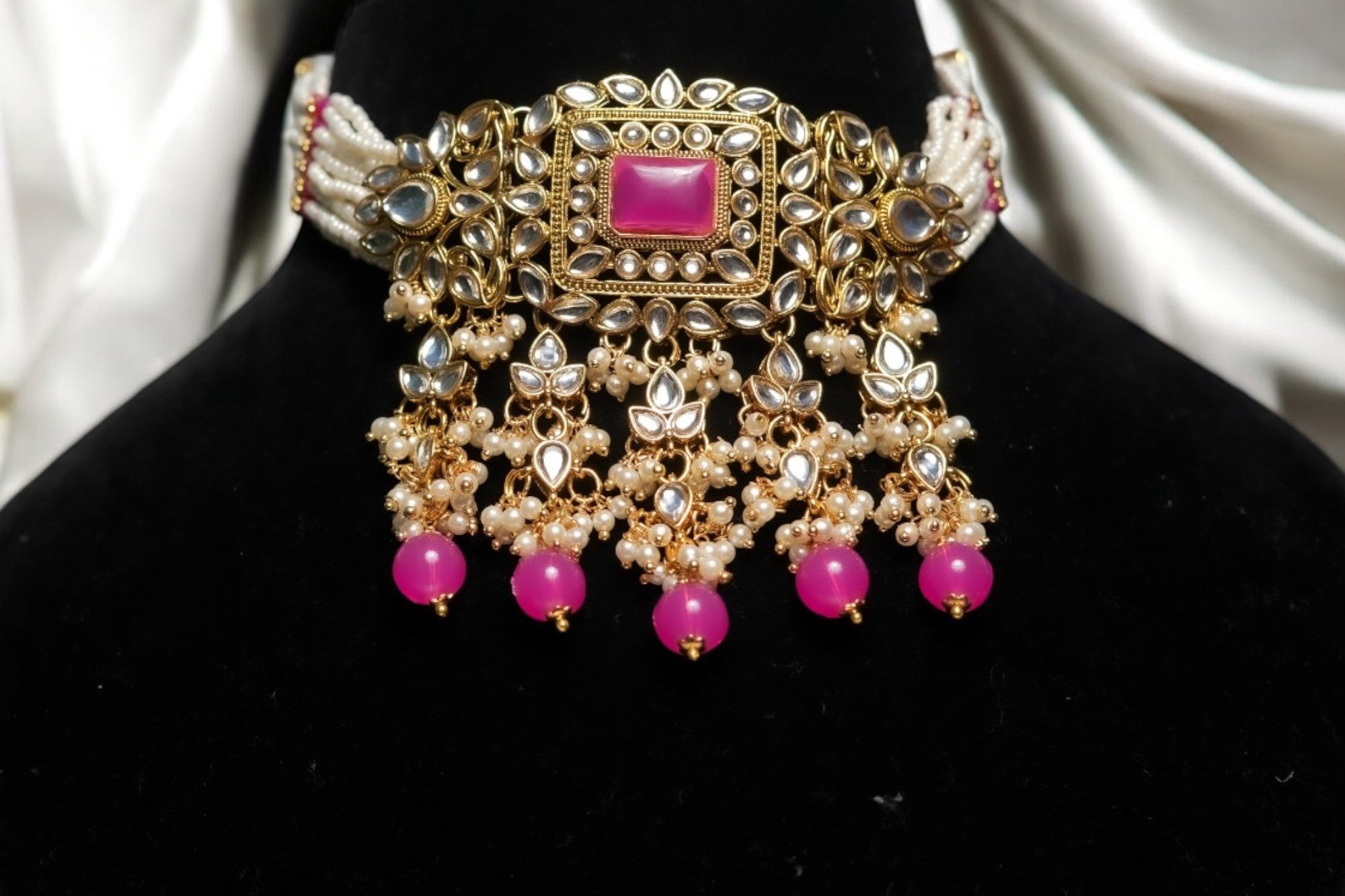 pearl strings golden kundan choker set with pink stones