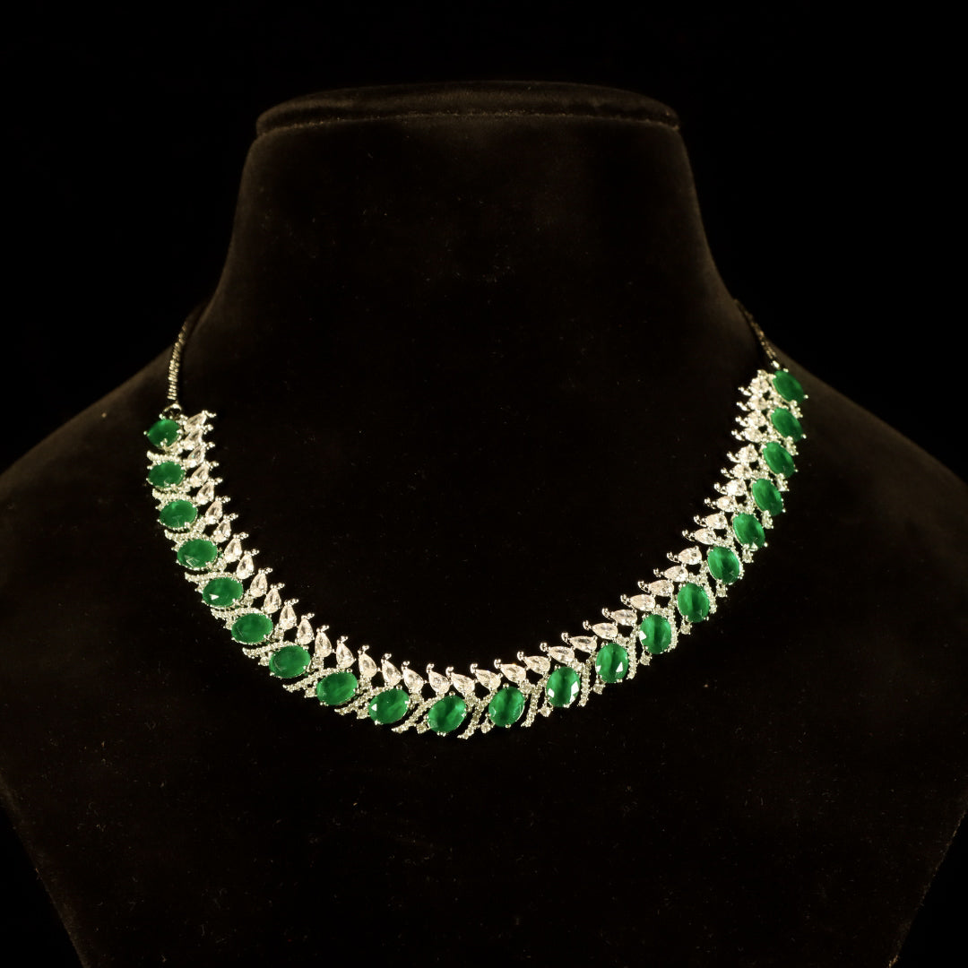 diamond and emerald earrings and necklace set for wedding functions