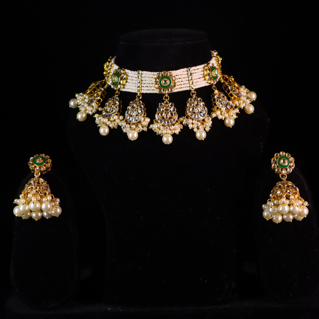 gold choker with pearl strings and golden pearls