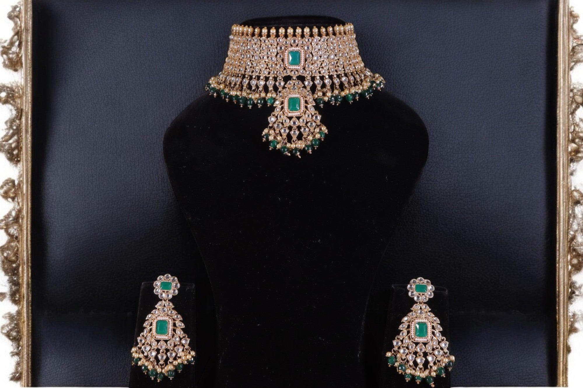 golden choker set with green dangling pearls