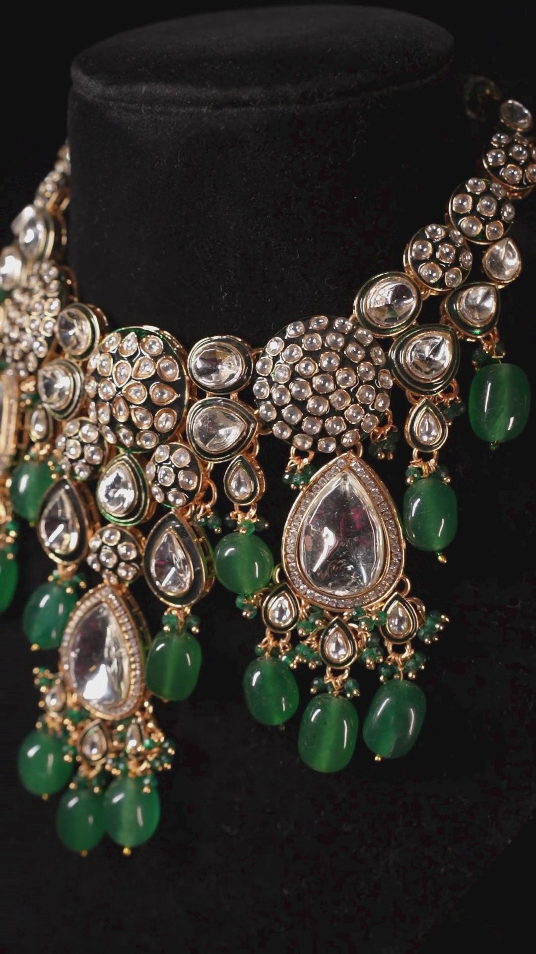 royal emerald and kundan stone bridal set with matching earrings and tikka