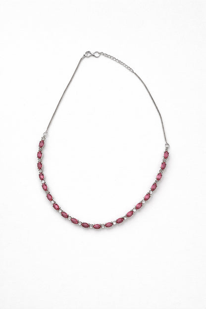 Necklace with pink beads on a white background