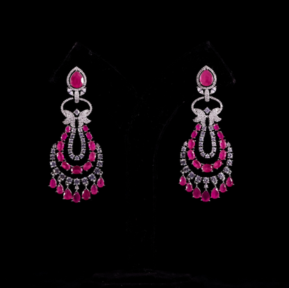 Pair of diamond earrings with pink ruby gemstones for cocktails and functions