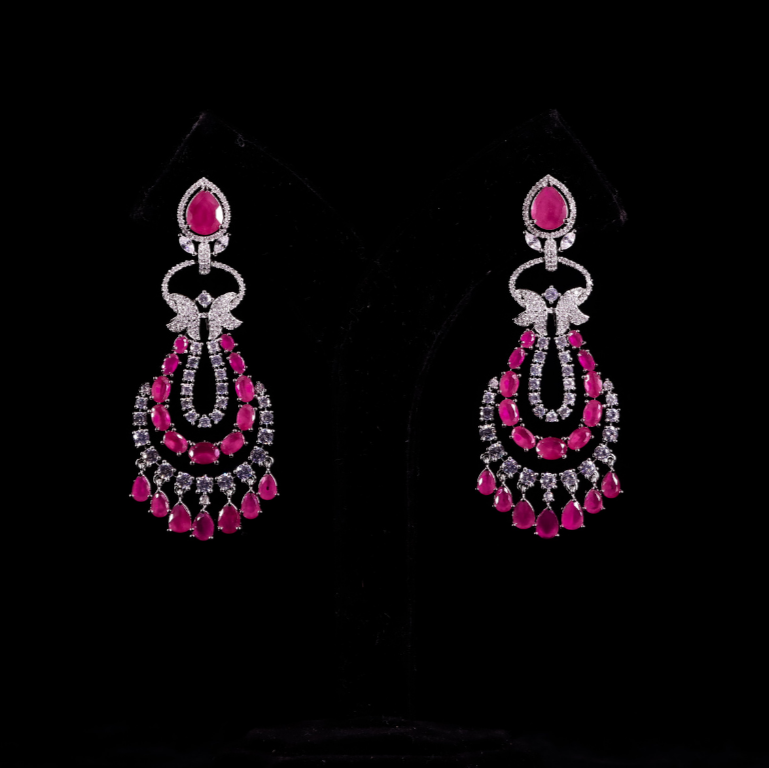 Pair of diamond earrings with pink ruby gemstones for cocktails and functions