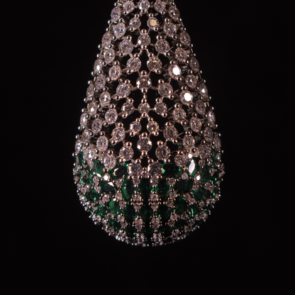 long diamond accent earrings with tiny emerald stones