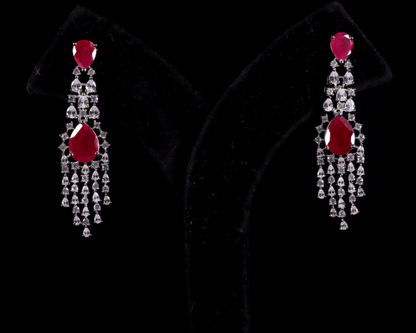 Pair of pink ruby gemstone earrings with diamond accents