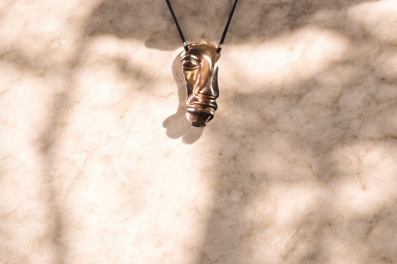 Hanging Face Neckpiece