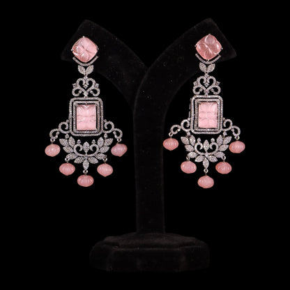 pair of baby pink gemstone earrings with diamonds in a beautiful chandelier shape