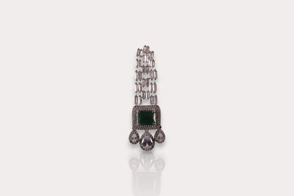 elegant diamond earrings with emerald gemstones