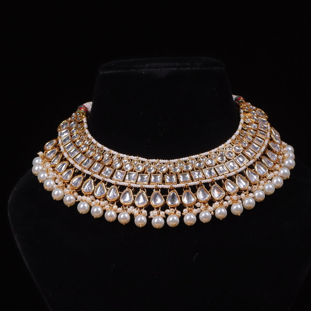 "AMIRA" Tusk White Kundan Set